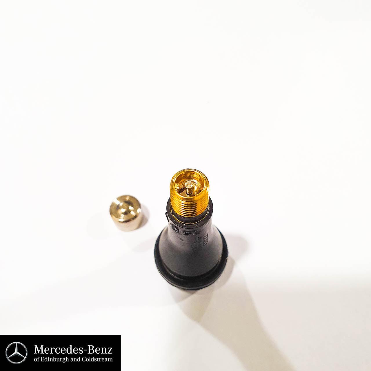 Tyre valve with metal cap